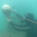 Mike Freeman cleaning the buoys on the USS Arizona